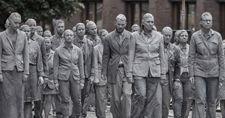 1000 ghostly figures march the streets of hamburg in protest for the G20 summit