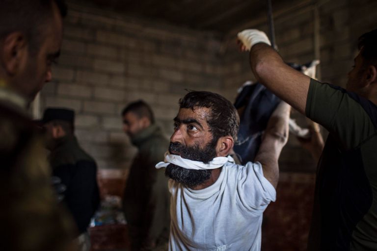 ‘Torture for fun’: Iraqi forces filmed executing hospital employee suspected of ISIS links