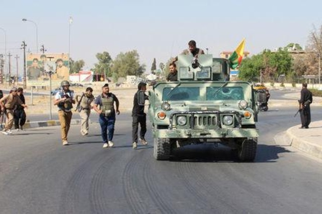 Iraqi forces seize oil city Kirkuk from Kurds in bold advance