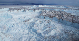 Decreasing cloud cover drives the recent mass loss on the Greenland Ice Sheet