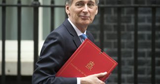 Chancellor Philip Hammond attacks Donald Trump’s tax cuts