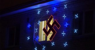 Latvian man lights up swastika Christmas ornament, authorities say it’s a folk symbol