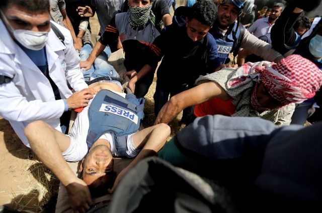 He was wearing a vest marked ‘PRESS.’ He was shot dead covering a protest in Gaza
