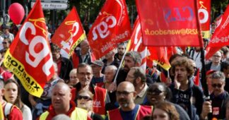 French workers protest attacks, Macron refuses to backdown