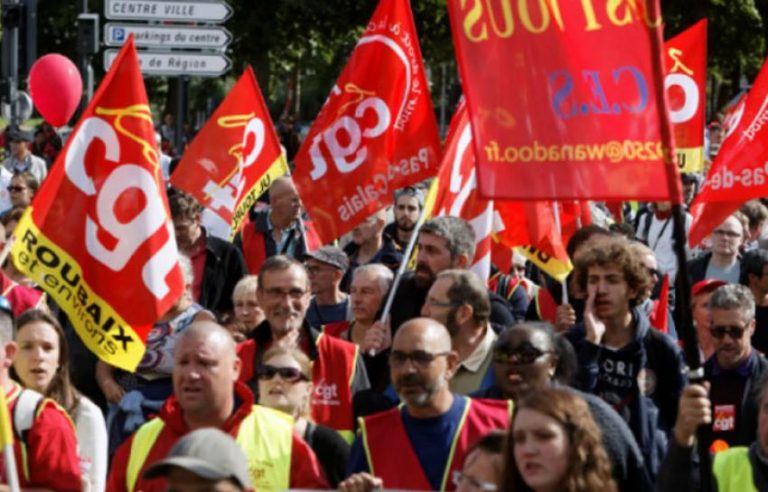 French workers protest attacks, Macron refuses to backdown