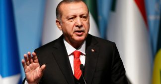 Turkey will not withdraw ships, Erdogan says; Greek delegation leaves in protest