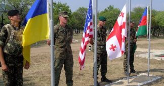 Poking the Russian Bear With the NATO Umbrella