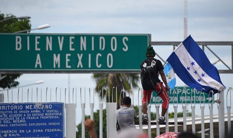 Why are thousands of Hondurans walking towards the US border?