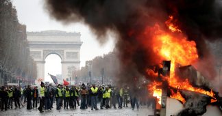 Battlefield Paris: Police hit protesters with tear gas as massive fuel rallies grip France