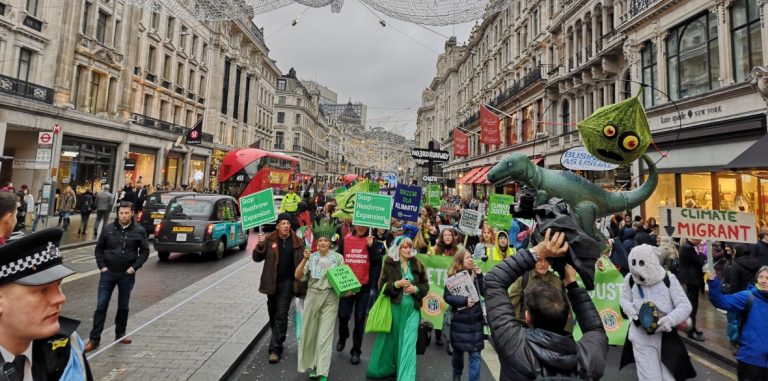 Campaigners march through London in protest against climate change