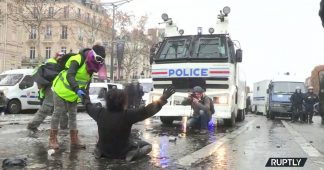 Water cannon & blood: Paris ‘Yellow Vest’ protest turns violent