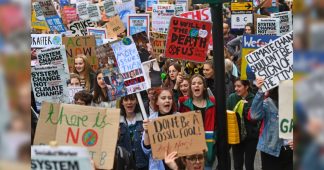 Thousands of students warn May to act on climate change