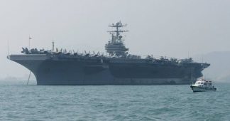 US threatens Iran with war