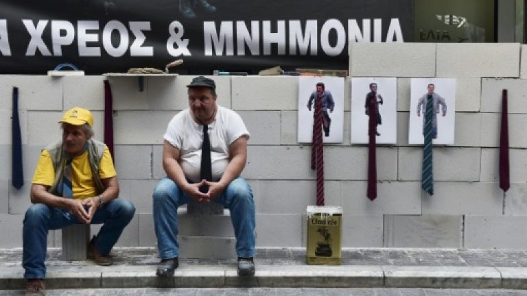 Crisis-hit Greeks foot steep bills for health and education