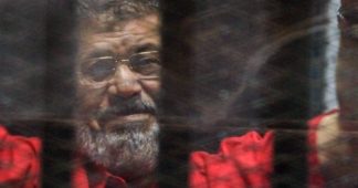 Mohamed Morsi: Six Years After Coup, Egypt’s First Democratically Elected President Dies in Court
