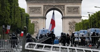 July 14th: People boo Macron