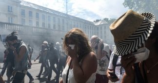 Clashes in Nantes as French police use tear gas on protesters following silent march