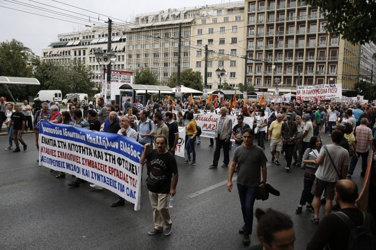 Greek workers walk out to protest against reform on strike action