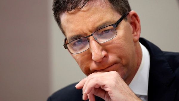 ‘Absolute red alert’: Journalist Glenn Greenwald charged with cybercrimes in Brazil