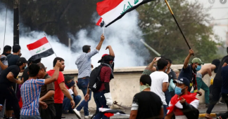 More than 20 killed as anti-government protests grip Iraq