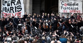 Striking Paris Opera artists perform outdoor concert against pension reforms – while Macron flees theater amid protests