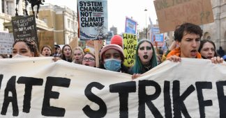 Thousands of kids across Britain take to the streets demanding government fights climate change