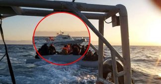 Footage shows Turkish boat escorting migrant dinghy