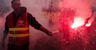 French unions set to intensify struggle as Macron bypasses parliament on pension reforms