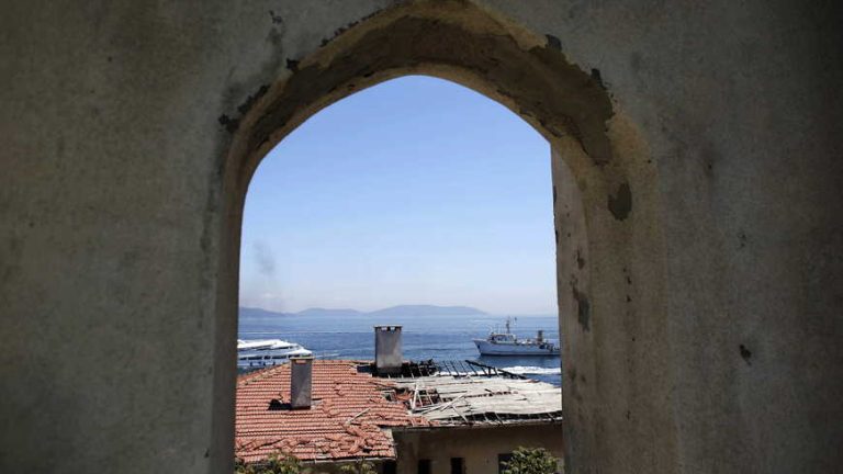 Erdogan dedicates Turkish island project to hanged idol