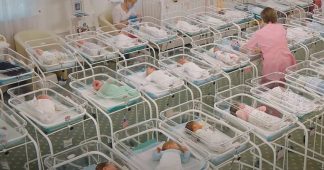 Dozens of babies born to Ukrainian surrogate mothers left stranded in Kiev hotel due to Covid-19