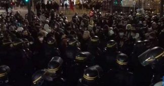 Police use water cannon against protesters in Paris amid clashes over Global Security Bill