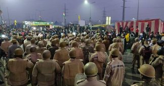 India’s defiant farmers resist attempts to evict them from protest site