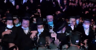 Orthodox Jews defy health protocols & clash with Israeli police at funeral of rabbi who died of Covid-19