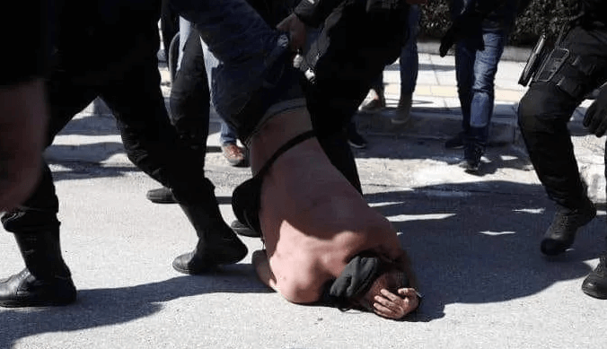 Police brutality against protesting student in Thessaloniki