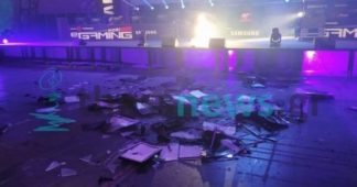 Gamers smash dozens of PC screens to celebrate end of Gameathlon and 85. TIF