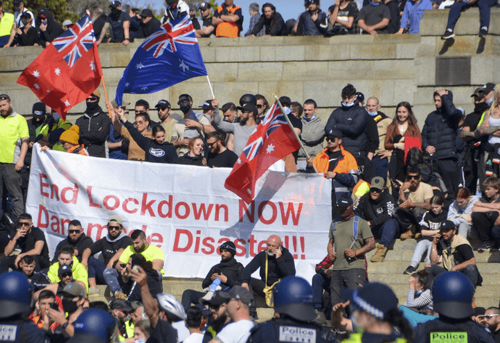 Stasi of the suburbs turn neighbours against each other as Aussie police spend months tracking down anti-lockdown protesters