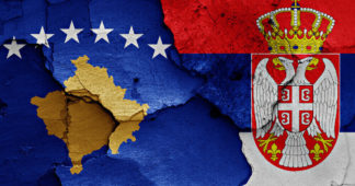 Serbia inks deal with breakaway Kosovo region to end spat that featured jet flyovers and tanks at border