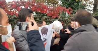 Turkish ultra-nationalist youth group hoods U.S. soldiers in Istanbul
