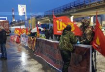 Dock workers in Genoa protest transit of arms through their port