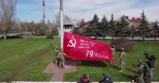 Russian Soldiers Raising Soviet Flag Over Occupied Ukraine Cities