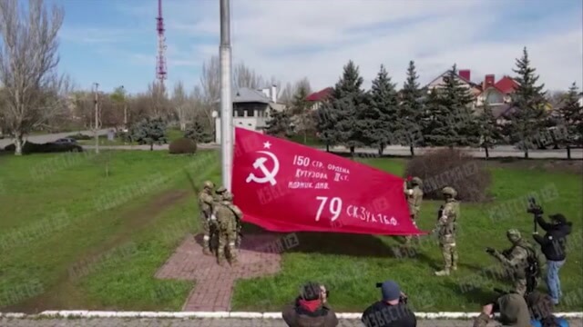 Russian Soldiers Raising Soviet Flag Over Occupied Ukraine Cities