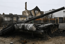 Video appears to show Ukrainian soldiers executing Russian soldier captured in an ambush outside Kyiv