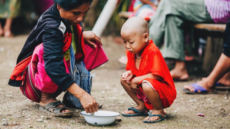Who is responsible for starvation and rising food prices?