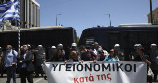 Greek health workers stop work for hours in protest against privatization bill