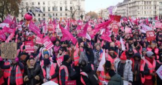 Tens of thousands gather to back striking posties