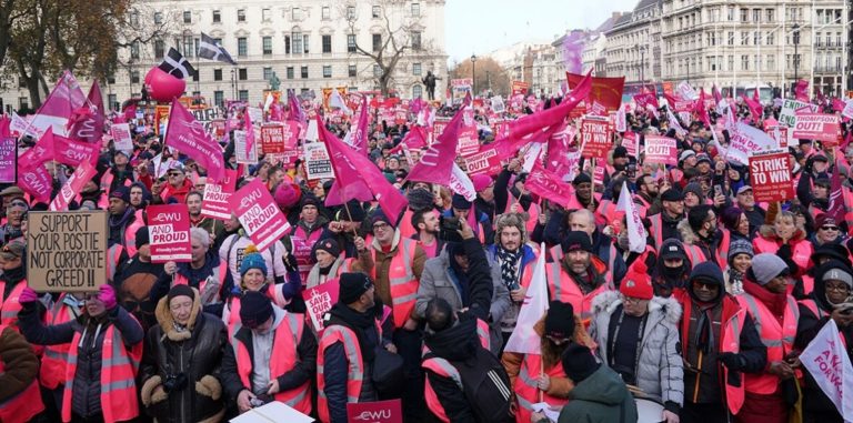 Tens of thousands gather to back striking posties