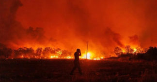 Anger rises in Greece as fires destroy homes near Athens