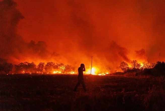 Anger rises in Greece as fires destroy homes near Athens