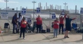 Historic auto strike hits Big Three at once