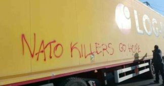 Protesters in NATO country block trucks carrying weapons for Kiev